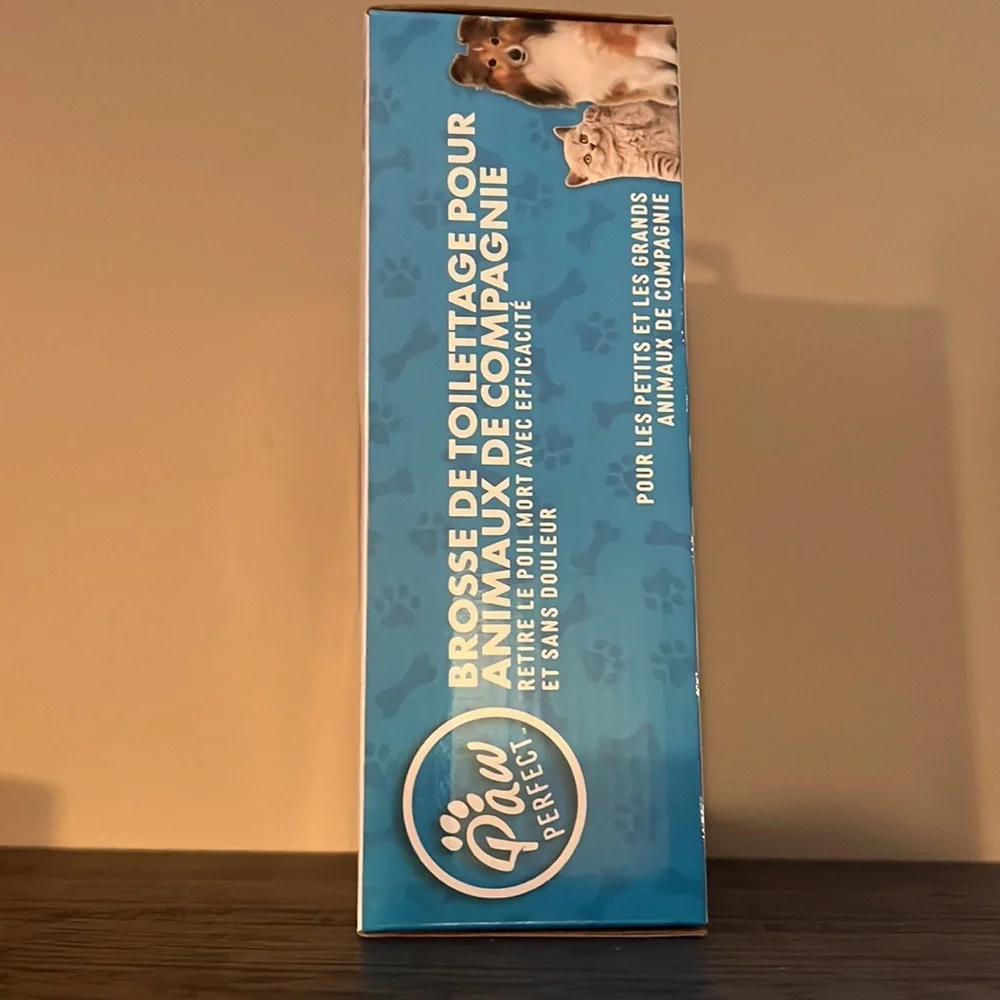 Paw perfect pet grooming brush
